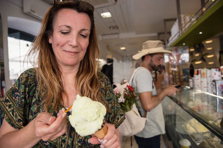 woman with an ice cream or Italian ice dessert