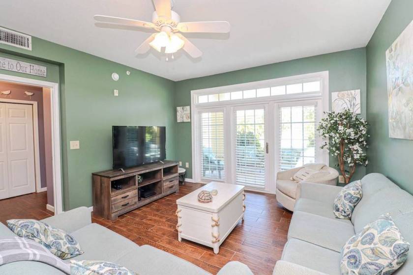 living room view of vacation rental at seaside at anastasia